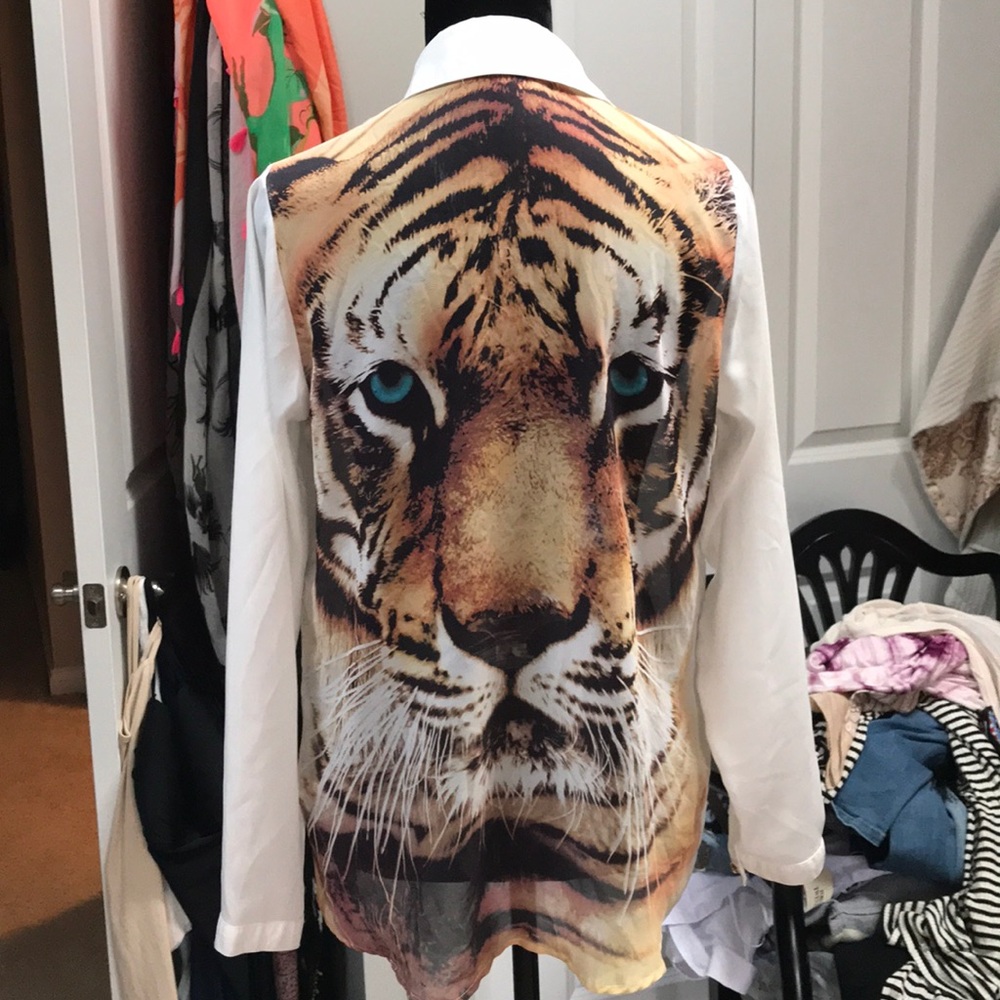 Sheer blouse with tiger print on back